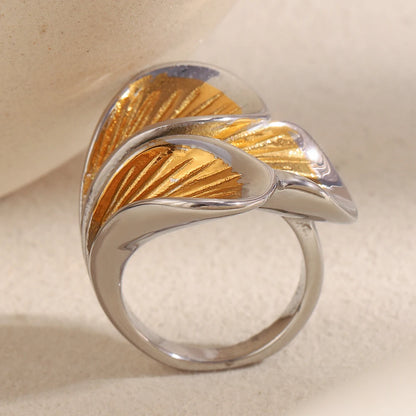 Flora Petal Cocktail Ring in silver and 18k gold PVD, close-up petal detail on the hand