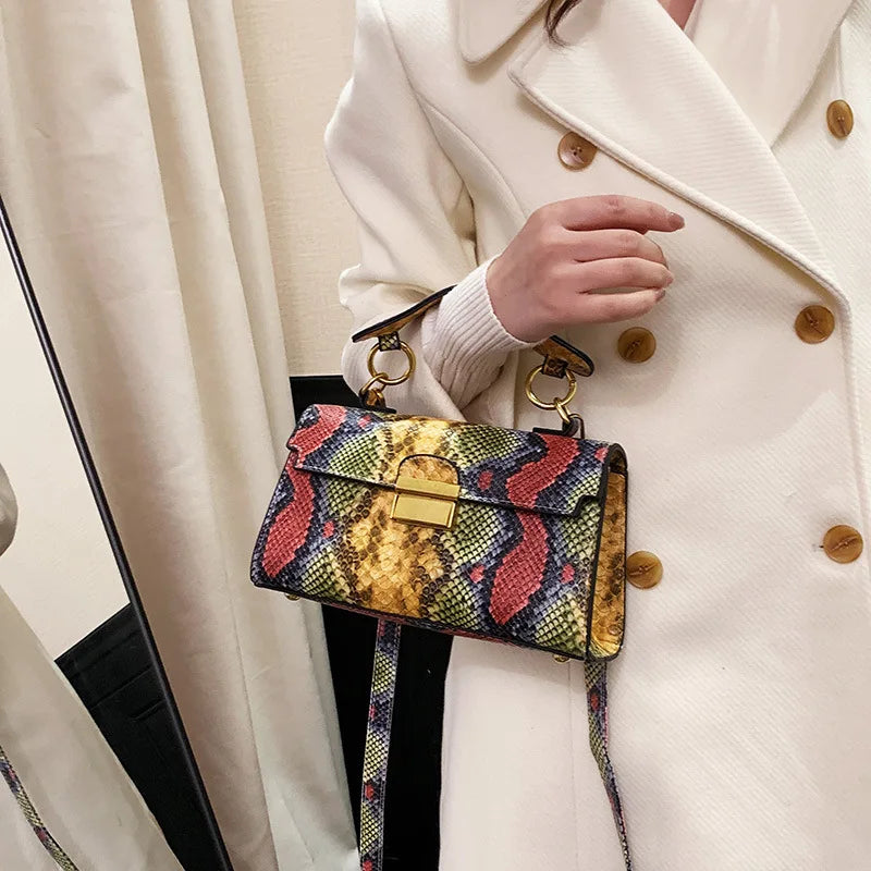 Serra snake-print bag worn on the shoulder