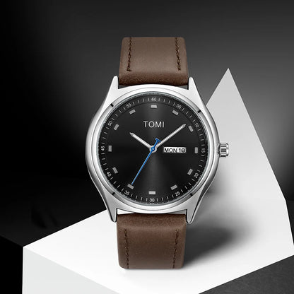 Emerson Minimalist Calendar Watch, silver case with brown strap, styled studio shot