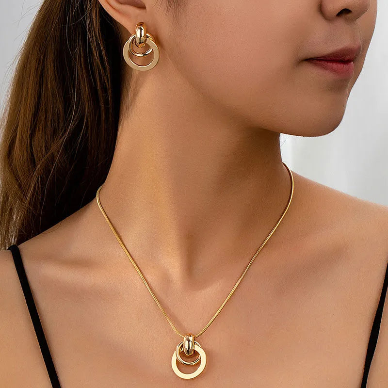 Circa gold-tone jewelry set on model