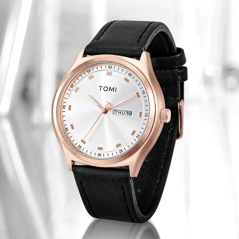 Emerson Minimalist Calendar Watch, rose gold case with black strap, styled studio shot