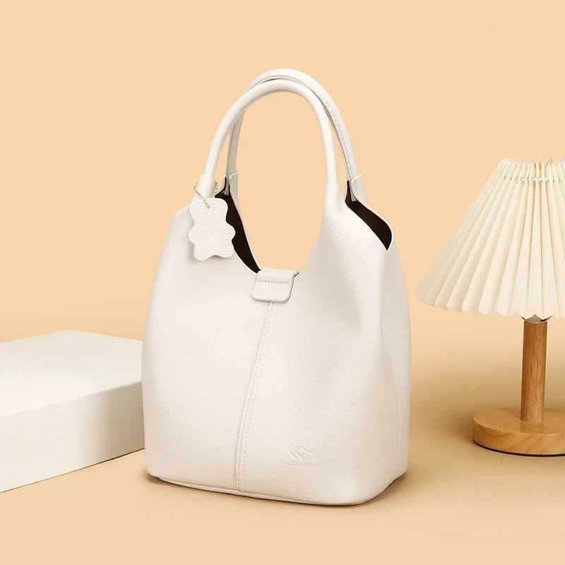 Lena leather bucket bag styled lifestyle
