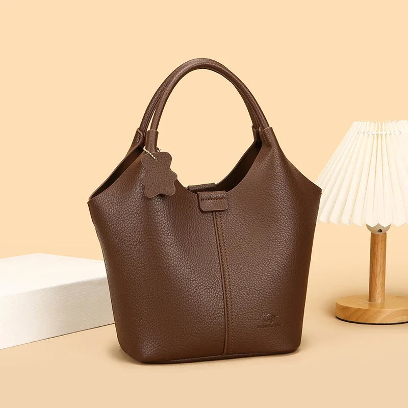 Lena leather bucket bag styled lifestyle