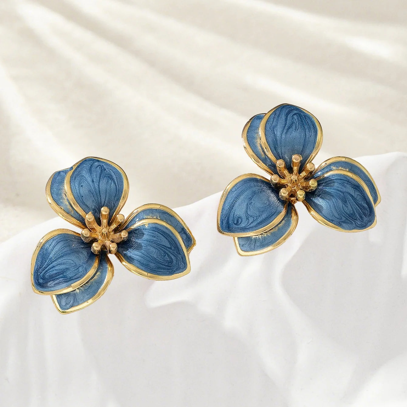 Flora enamel flower stud earrings in dusty blue