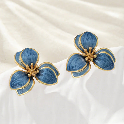 Flora enamel flower stud earrings in dusty blue