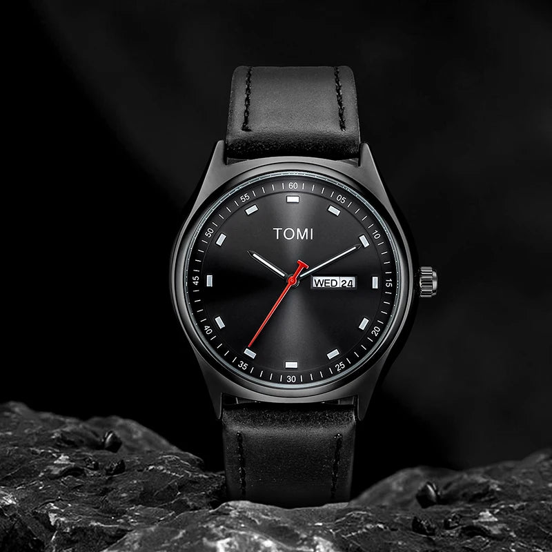 Emerson Minimalist Calendar Watch in all black, styled studio shot