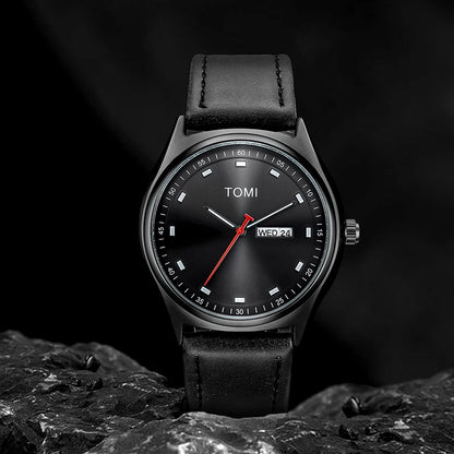 Emerson Minimalist Calendar Watch in all black, styled studio shot