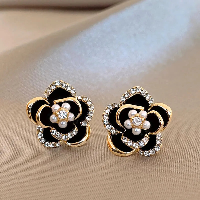 Gold Camellia black flower studs