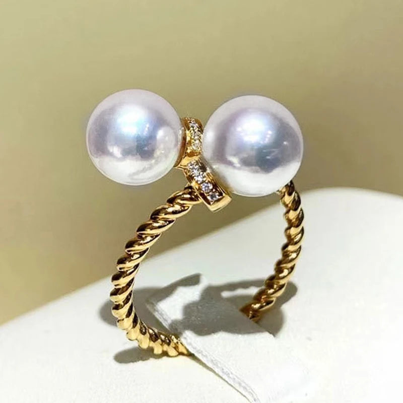 Maeve Double Pearl Twist Ring in gold, side profile of the twisted band