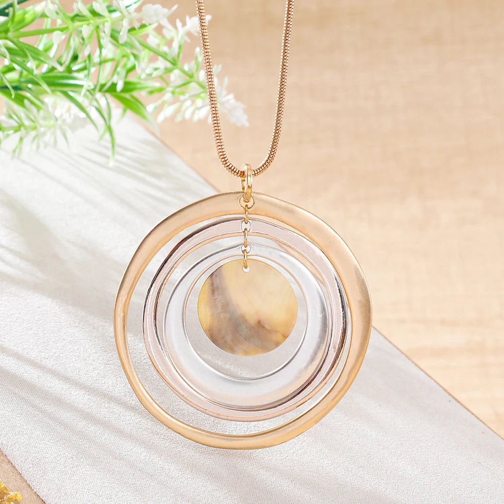 Linnea Layered Disc Necklace layered rings close up
