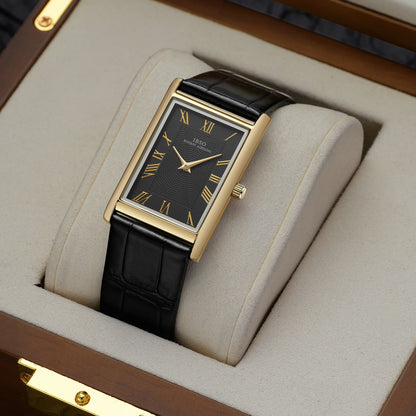Carlyle rectangular dress watch, gold-tone case with black dial resting in a wooden presentation box