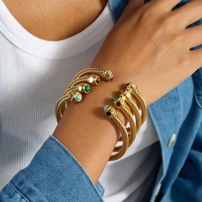 Reina cuff bracelets stacked on wrist
