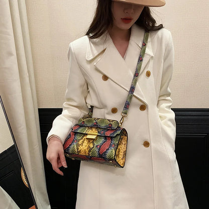 Serra snake-print bag worn crossbody