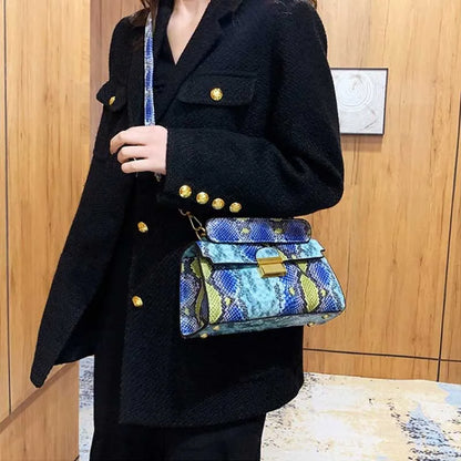 Serra snake-print bag worn crossbody