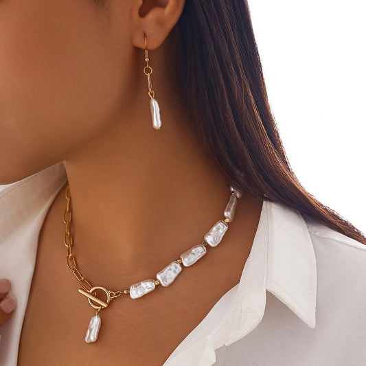 Isolde baroque pearl and gold set on model