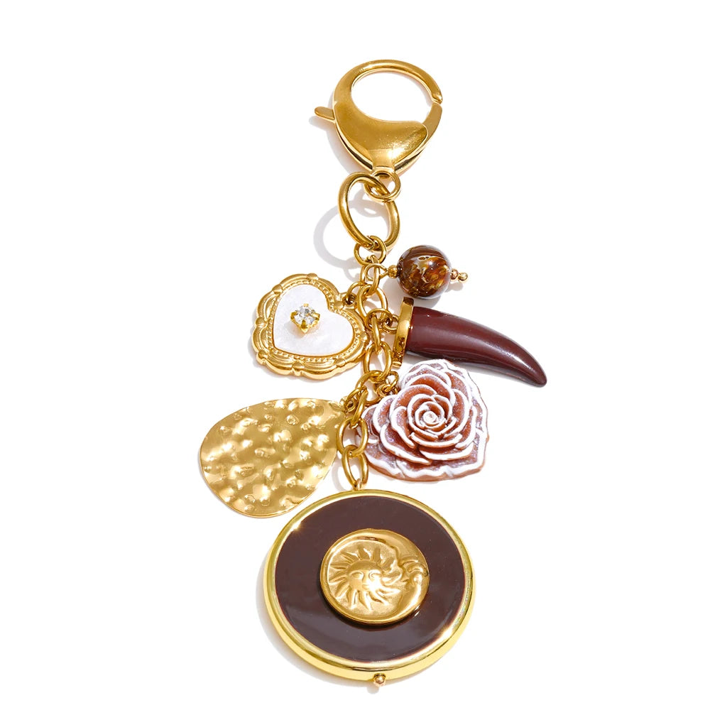 Elba Sun Charm Keyring gold burgundy charm cluster