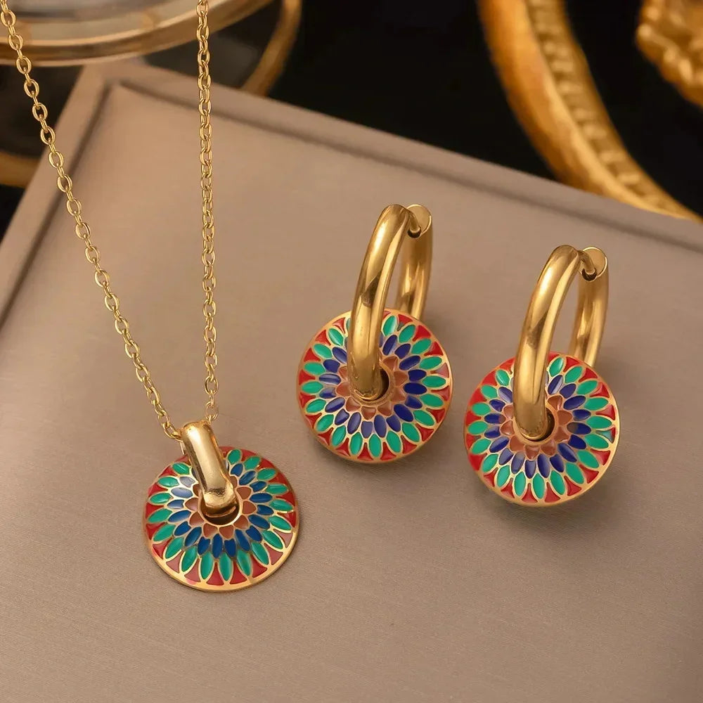 Lucia enamel medallion jewelry set, gold hoop earrings and pendant necklace with red, green and blue enamel medallions