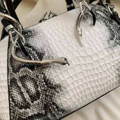 Renata white snake-print top-handle bag detail