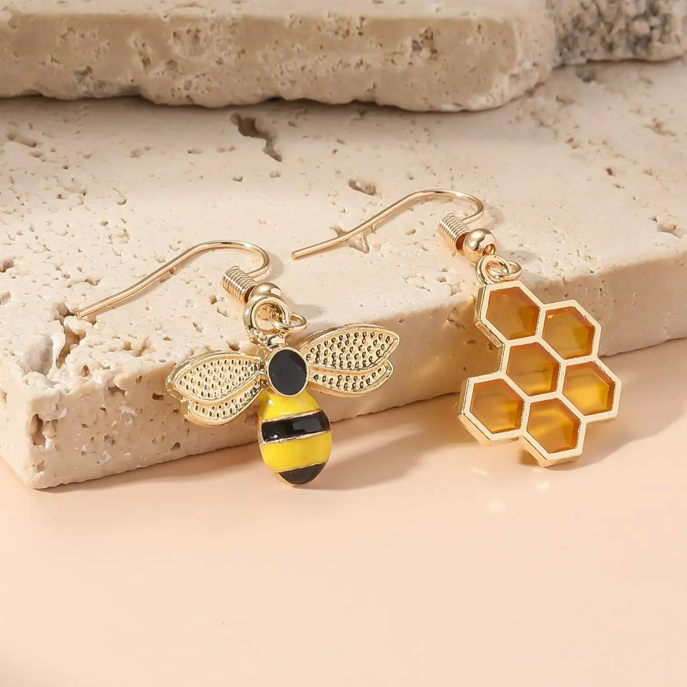 Willa Honeybee Drop Earrings mismatched pair on stone
