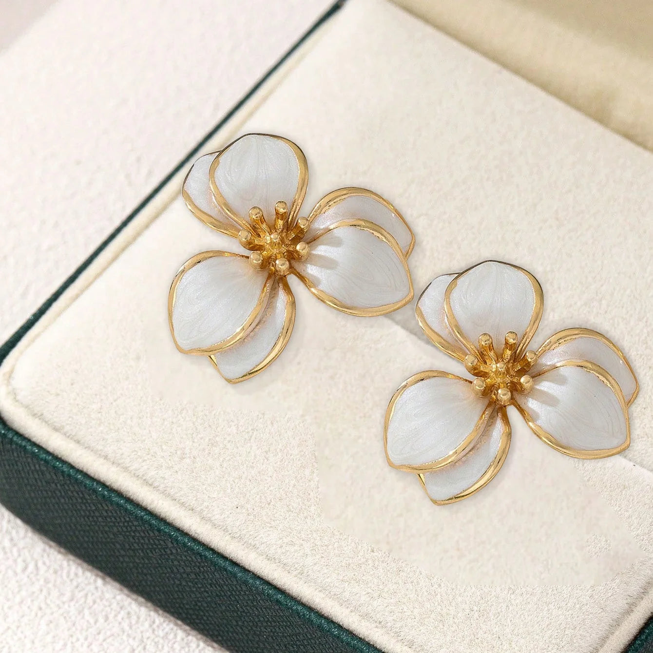 Flora enamel flower stud earrings in ivory