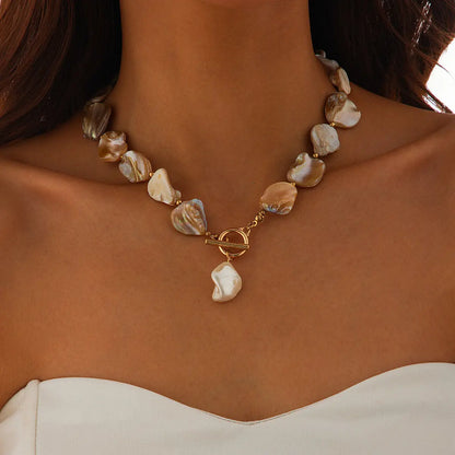 Nacre champagne shell choker on-model
