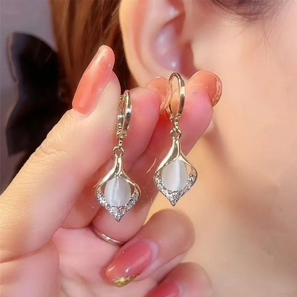 Petal earrings champagne on model