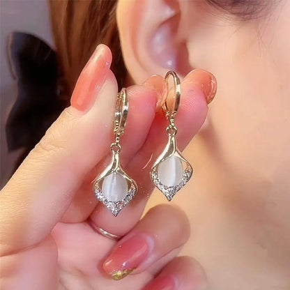 Petal earrings champagne on model