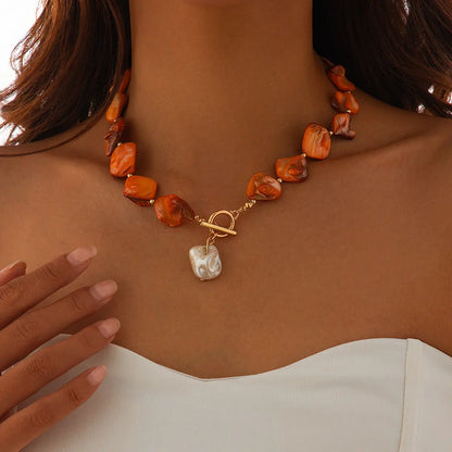 Nacre amber baroque shell choker on-model