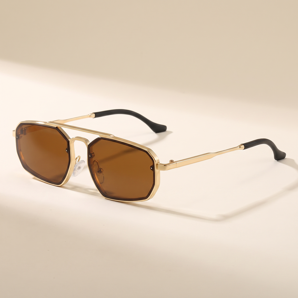 Adele-Cat-Eye-Sunglasses Gold Tea — flatlay 1