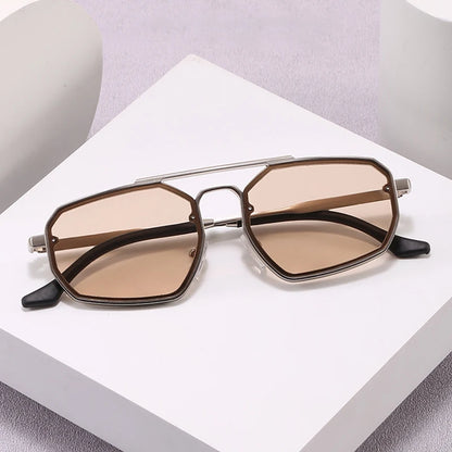 Adele cat eye sunglasses styled on a plinth