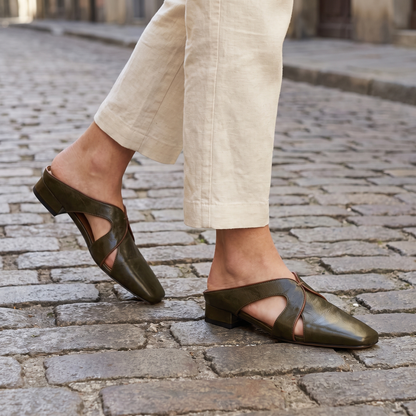 Arden Leather Cutout Mules Olive — on model