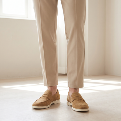 Brody Penny Loafers in Camel worn by a male model
