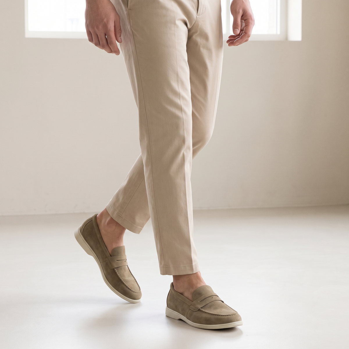 Brody Penny Loafers in Taupe worn by a male model