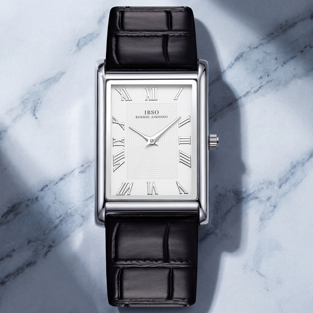 Carlyle rectangular dress watch in silver-tone on white marble with the strap laid out flat