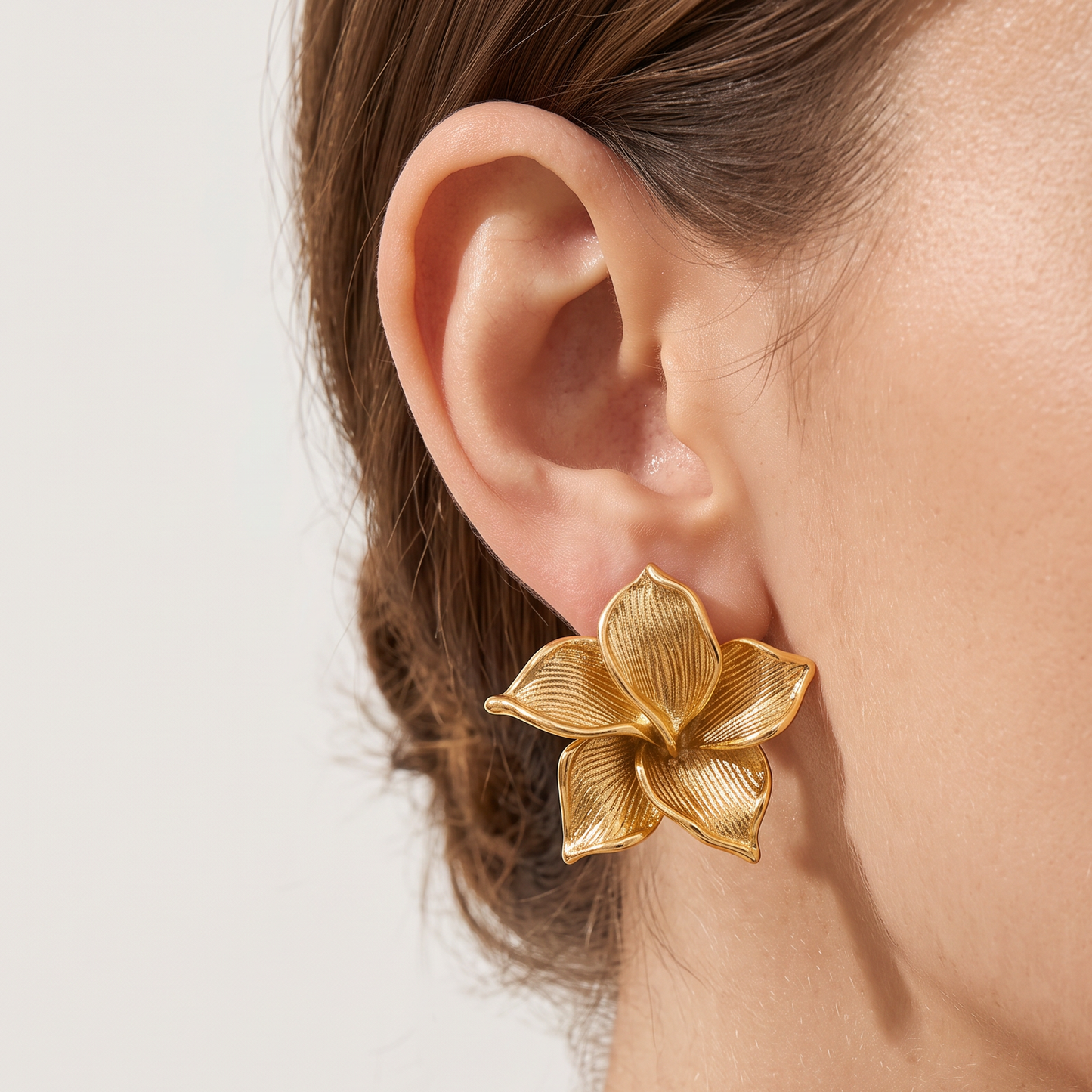 Cassia-Flower-Stud-Earrings Gold — on model