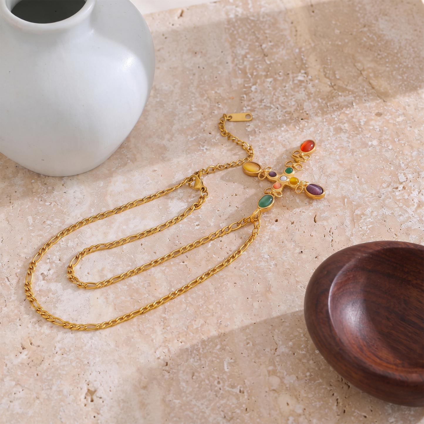 Cruz Multi-Stone Cross Necklace draped chain detail with natural stone cabochons