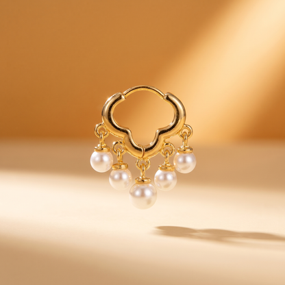 Daisy gold pearl huggie earrings hero