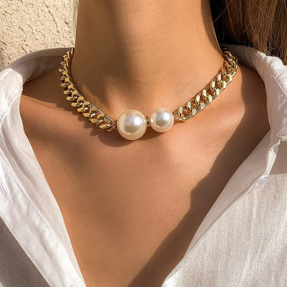Delilah pearl Cuban-link necklace in gold, worn