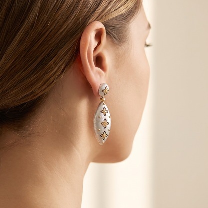Elena Brushed Clover Drop Earrings worn, angled profile