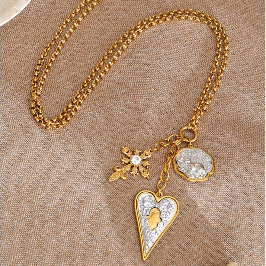 Elise Heart Charm Necklace two-tone charm cluster flat lay