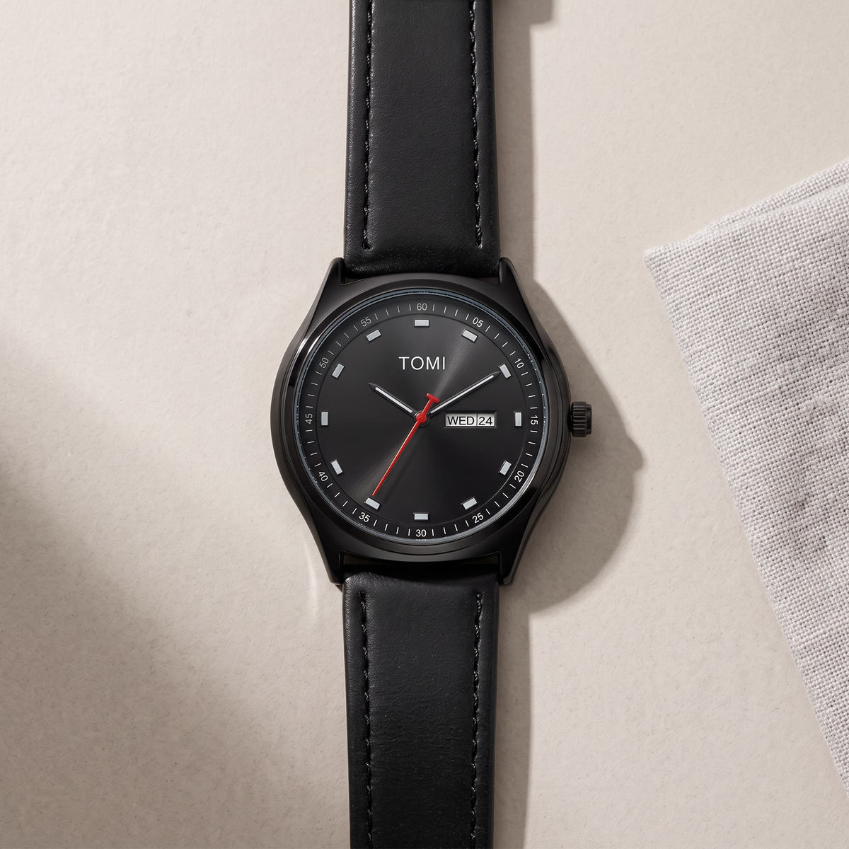 Emerson-Minimalist-Calendar-Watch All Black — flatlay 2