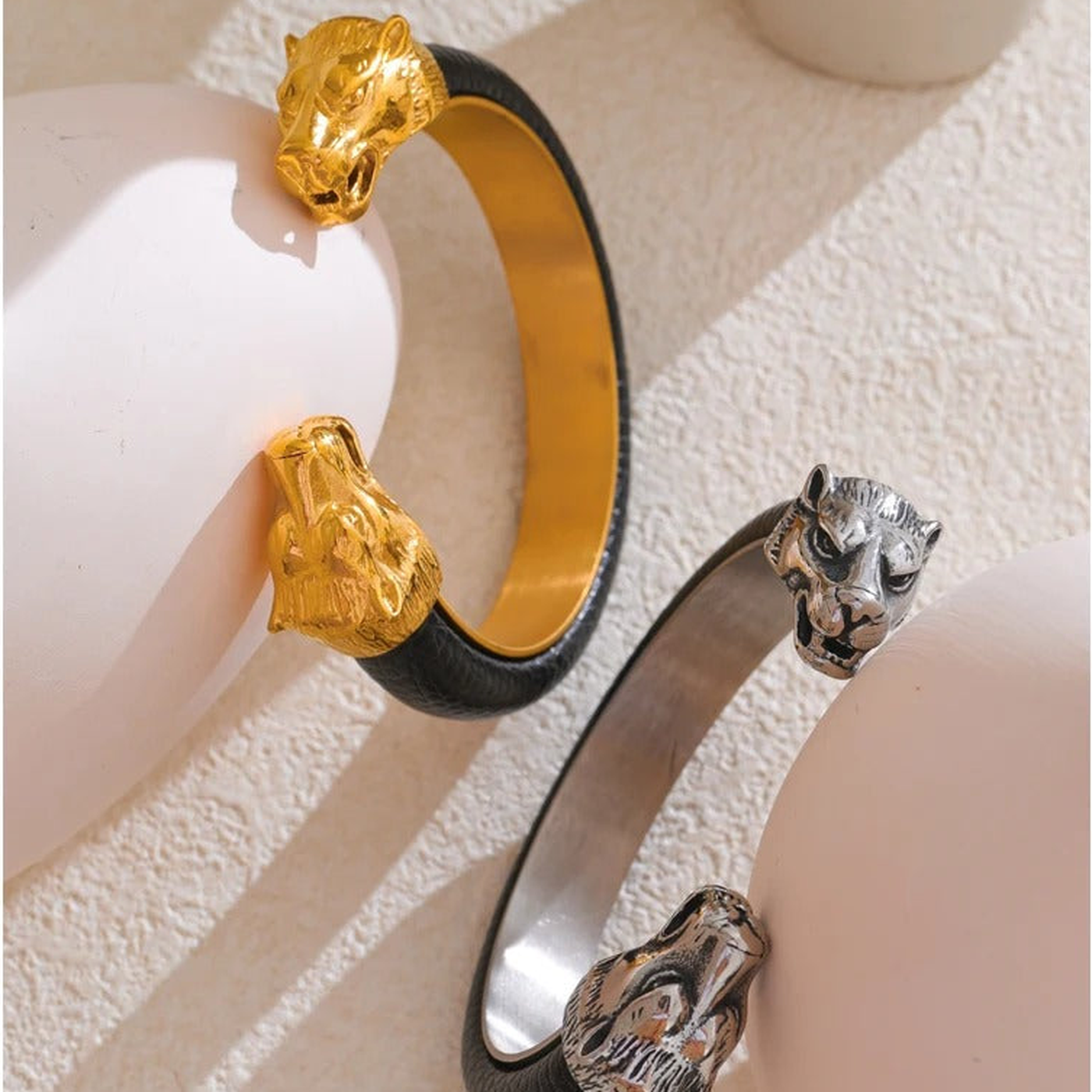 Maddox wolf cuff bracelets styled flat lay