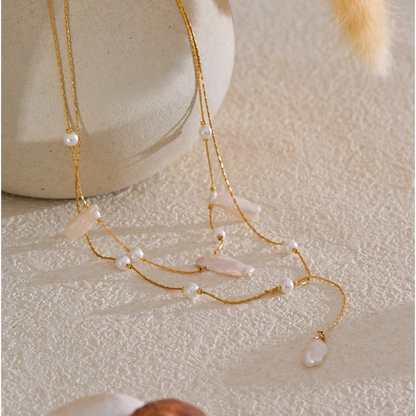 Catalina baroque pearl necklace lifestyle flat lay with dried pampas