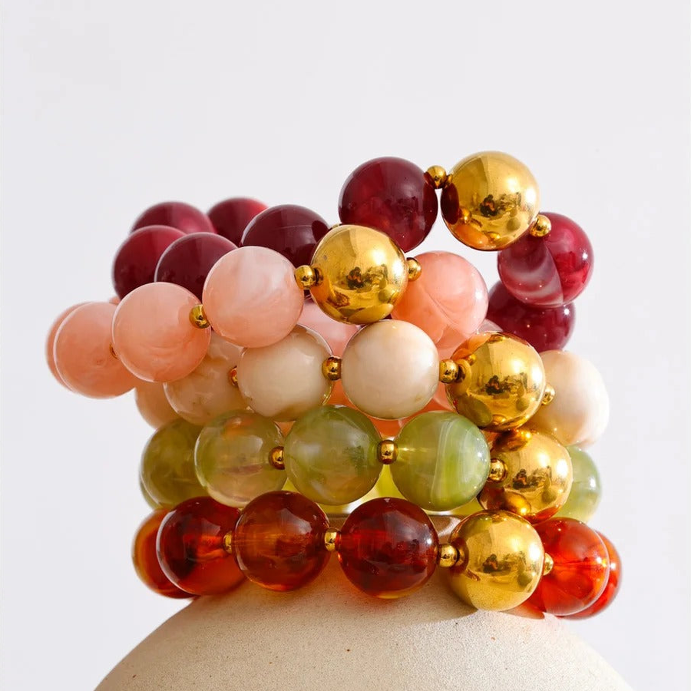 Malibu resin bead stretch bracelets stacked in all five colorways