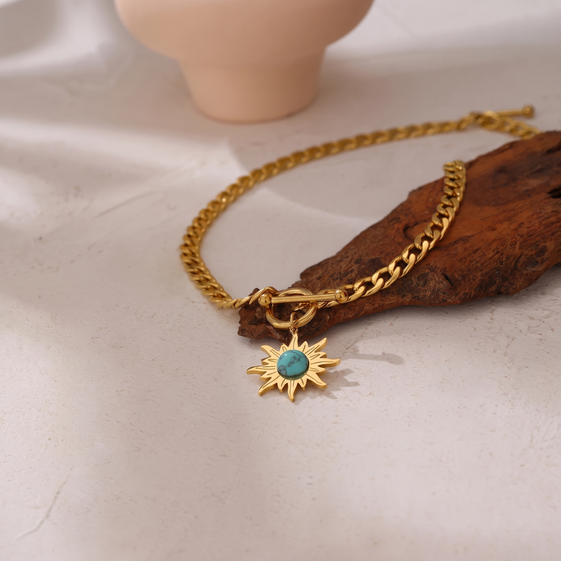 Helia Sunburst Pendant Necklace in Gold