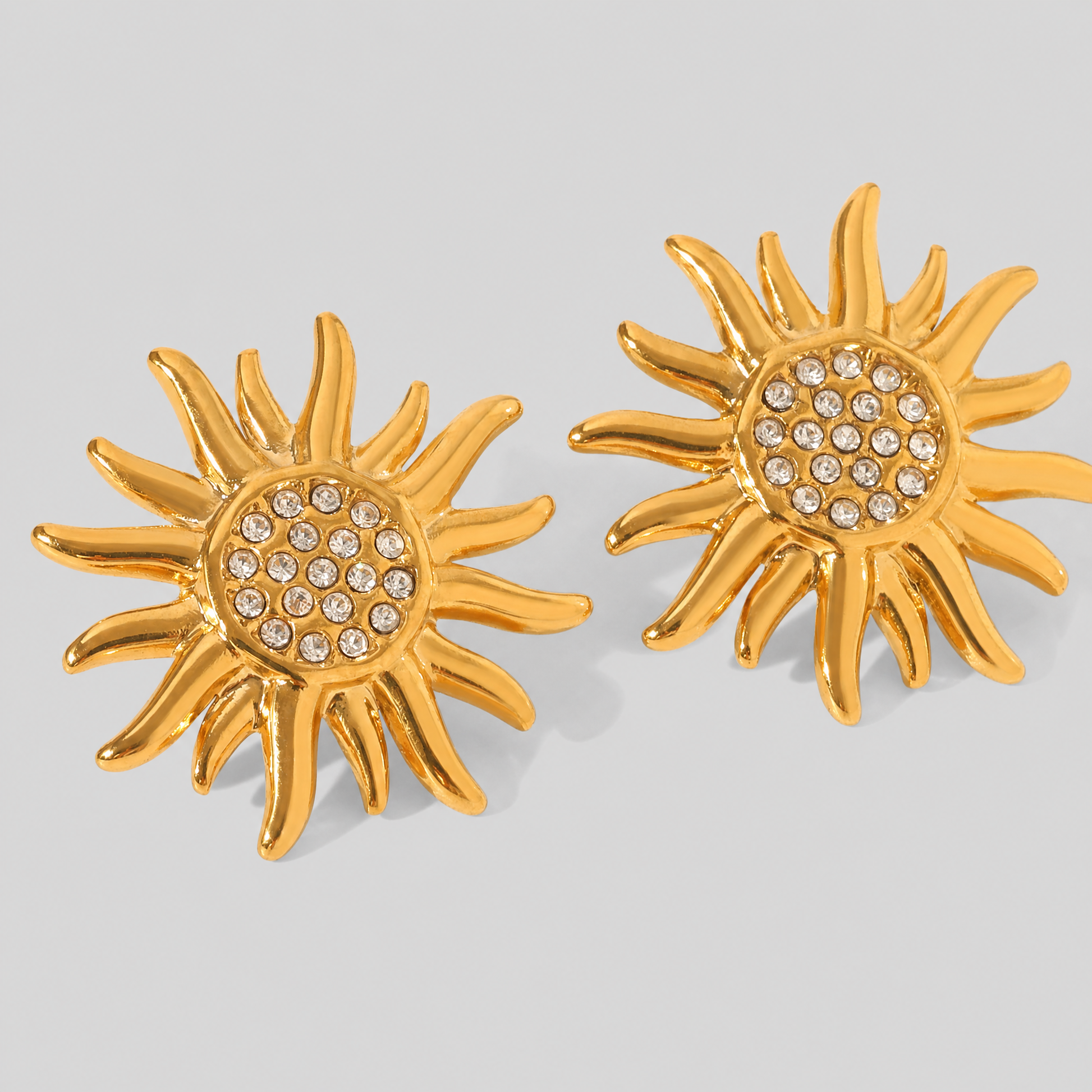 Helio sunburst earrings packshot