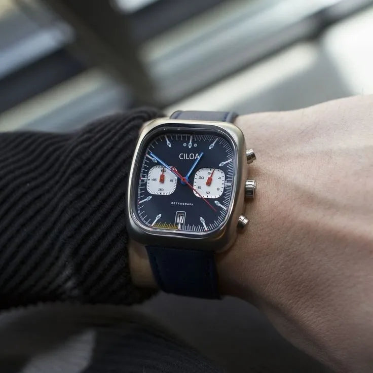 Holt square chrono watch, black leather strap, worn on wrist