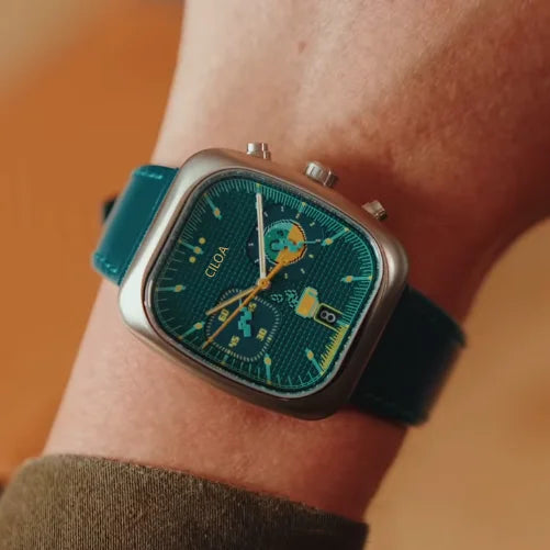 Holt square chrono watch, green leather strap, worn on wrist