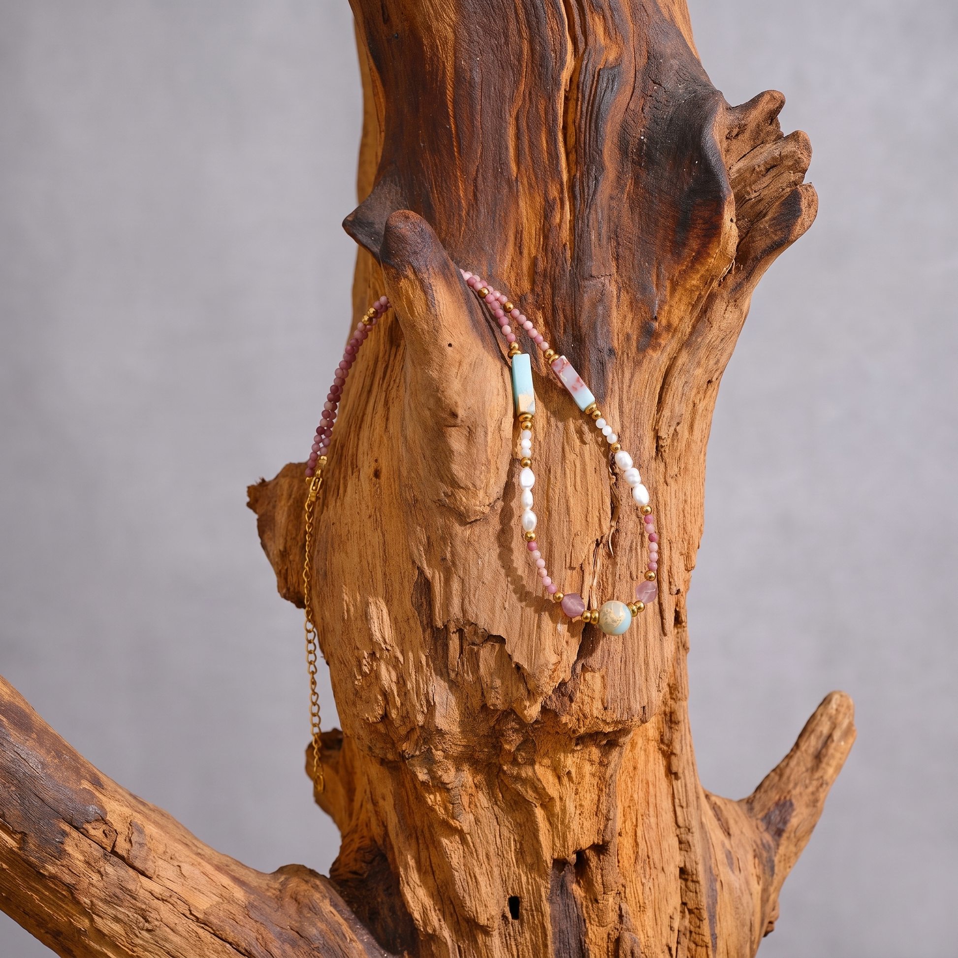 Isla Pearl Bead Necklace hanging detail with gold clasp