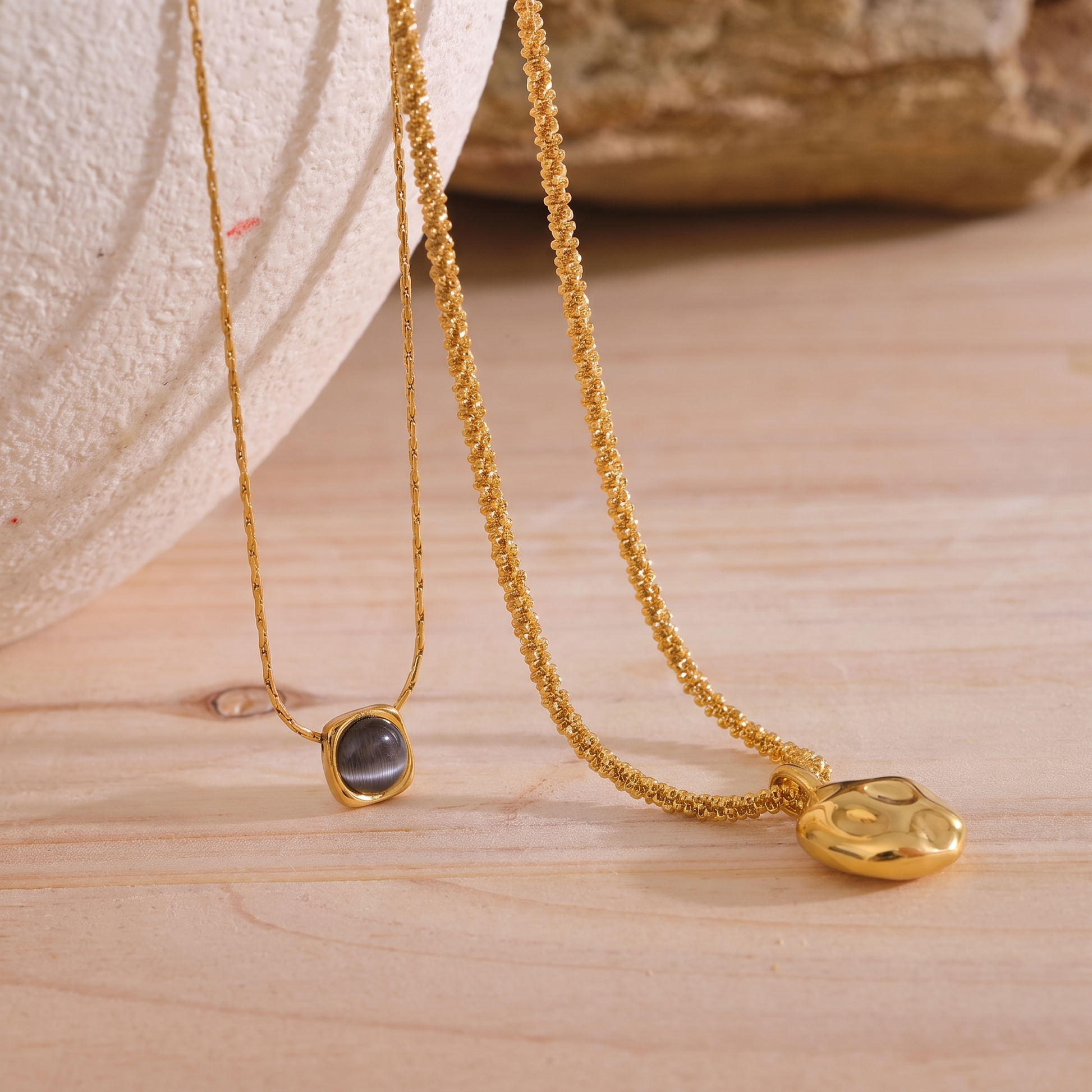 Liora Layered Stone Necklace draped chain detail with stone and pebble pendant
